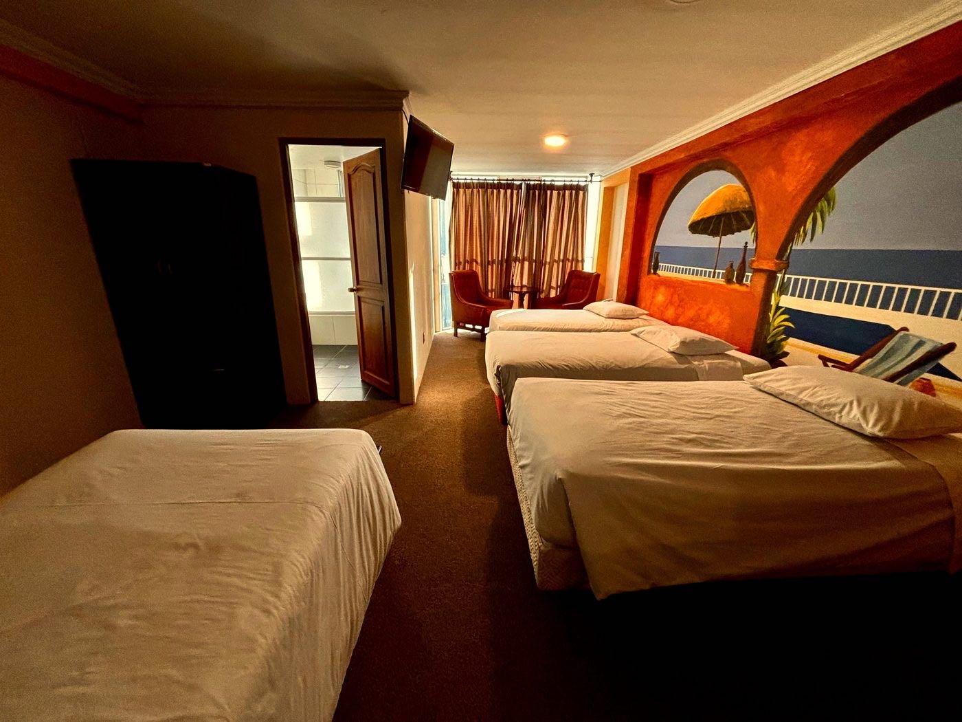 Habitación cuádruple con cuatro camas, Hotel Berlina La Paz